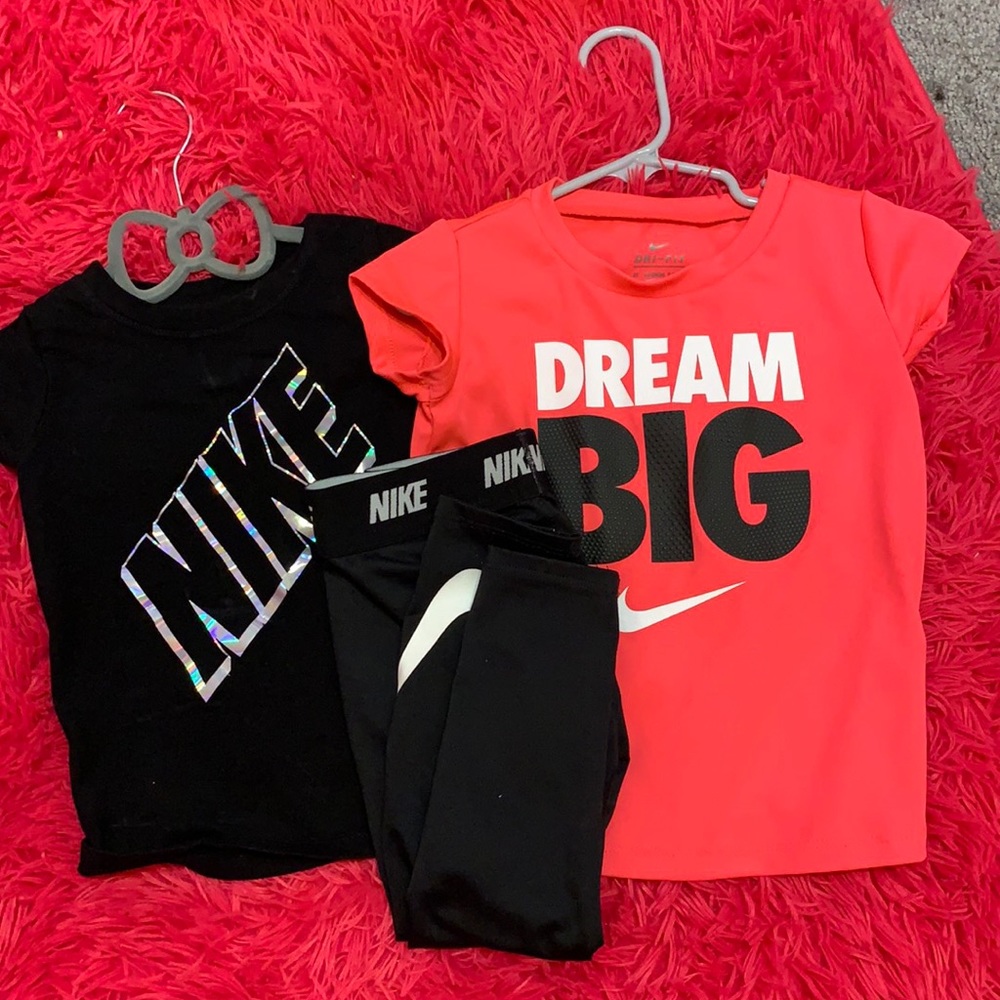 Two 3T shirts and 3T Nike leggings.